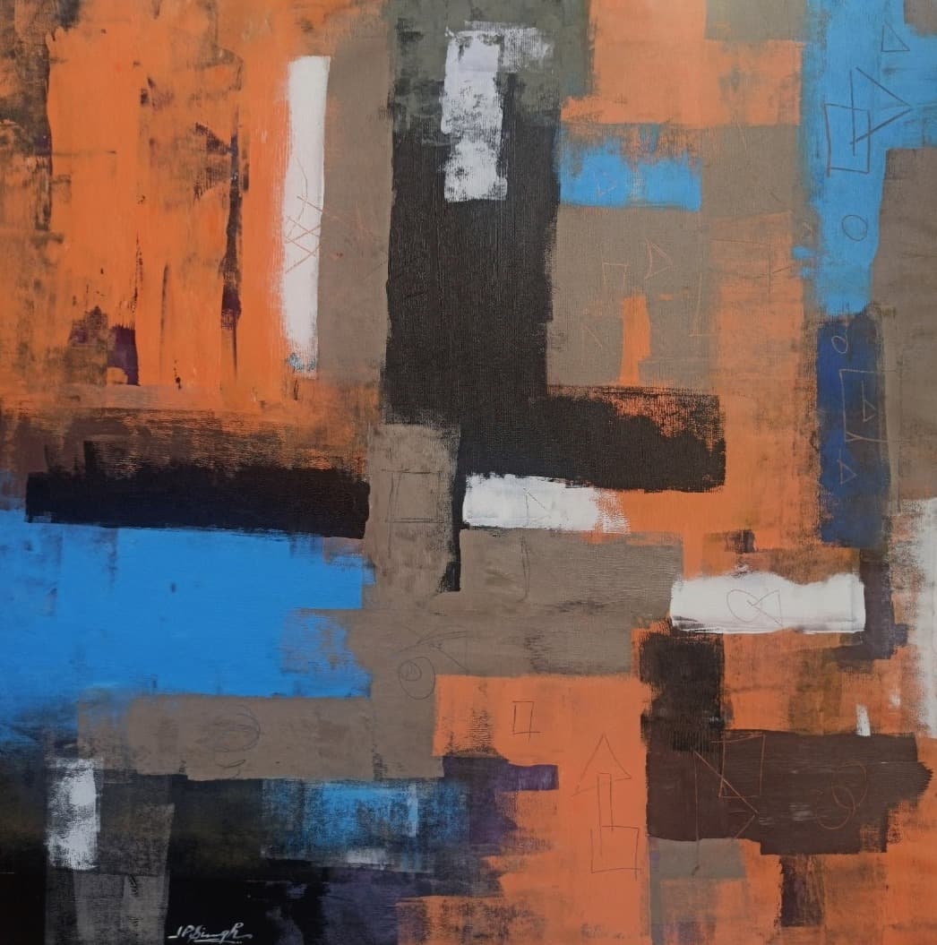 Interlocking orange, black, blue and taupe blocks with small white patches